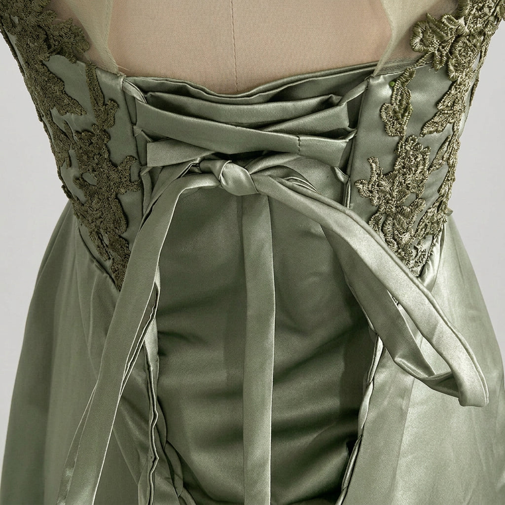 Satin bridesmaid dress bodice detail with embroidered lace and gathered bow front