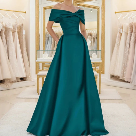 Off-shoulder satin A-line formal dress in dark teal, front bow detail