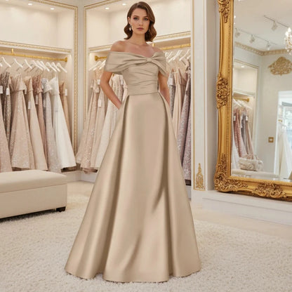 Off-shoulder satin A-line formal dress in champagne beige, front bow detail