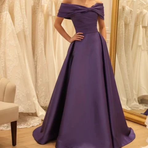 Off-shoulder satin A-line formal dress in dusty purple, front bow detail