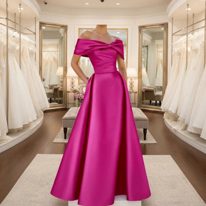 Off-shoulder satin A-line formal dress in fuchsia pink, front bow detail