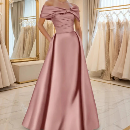 Off-shoulder satin A-line formal dress in dusty rose pink, front bow detail