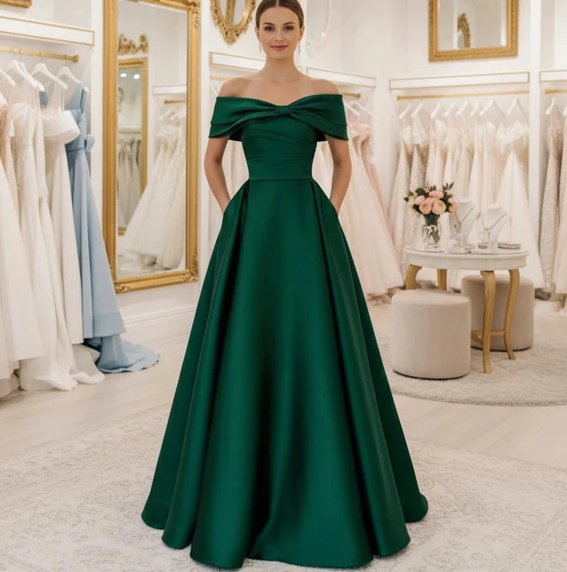 Off-shoulder satin A-line formal dress in dark green, front bow detail
