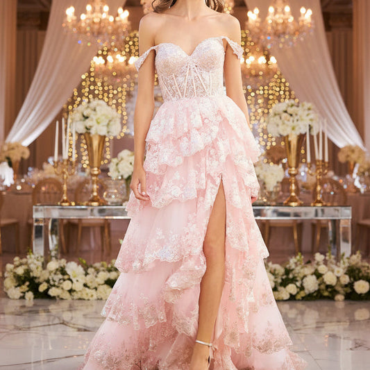 Pink formal lace gown with sweetheart neckline, layered skirt, and side slit