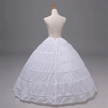 White 6-hoop crinoline petticoat with ruffled layers and front tie at waist