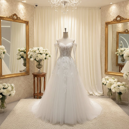 Ivory lace wedding dress with off-shoulder sleeves and voluminous flowing tulle A-line skirt