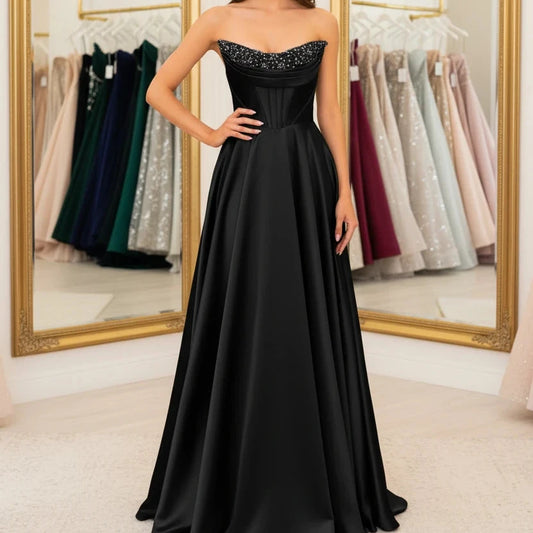 Black strapless beaded satin A-line evening gown with sparkling neckline trim