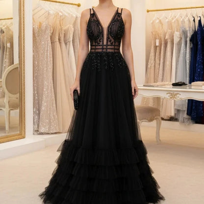 Black A-line evening dress, sheer lace bodice, deep V neck, tiered ruffles