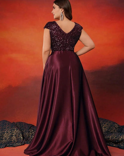 Burgundy evening dress with sequined V-neck and cap sleeves, satin flared skirt