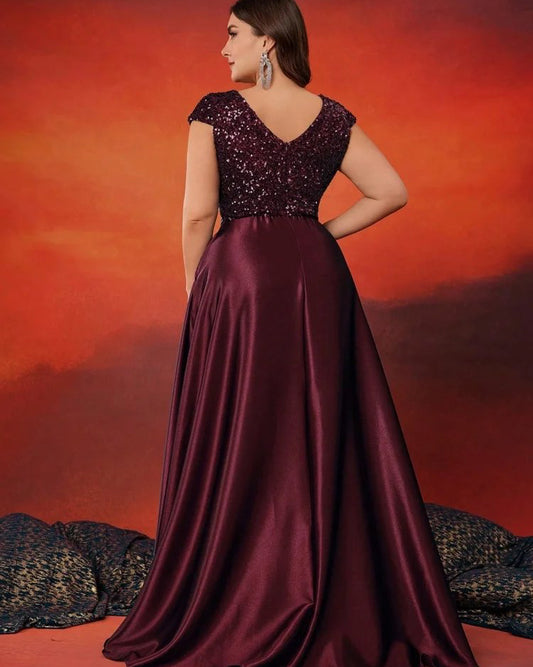 Burgundy evening dress with sequined V-neck and cap sleeves, satin flared skirt