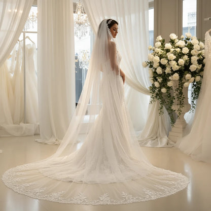 Cathedral wedding veil with single-tier tulle and lace border, full-length front drape