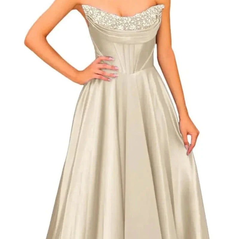 Champagne strapless beaded satin A-line evening gown with sparkling neckline