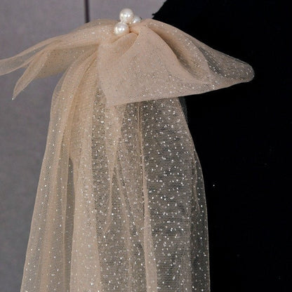 Champagne glitter tulle shoulder bow with pearl cluster and layered hanging fabric