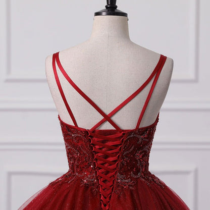 Red back corset with crisscross lace-up straps over sequin lace bodice