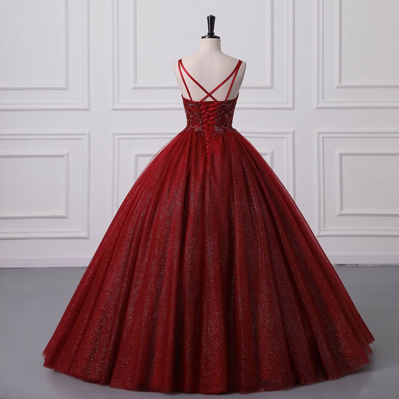 Red sequin lace bodice tulle ball gown with corset back crisscross straps