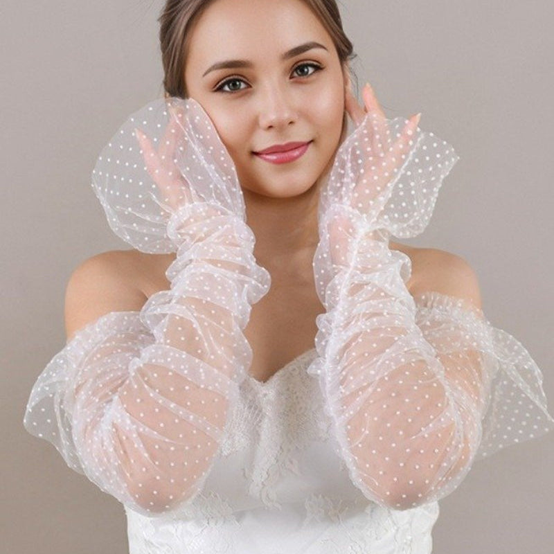 Sheer polka-dot long sleeves with gathered ruffled cuffs, white dots on light mesh