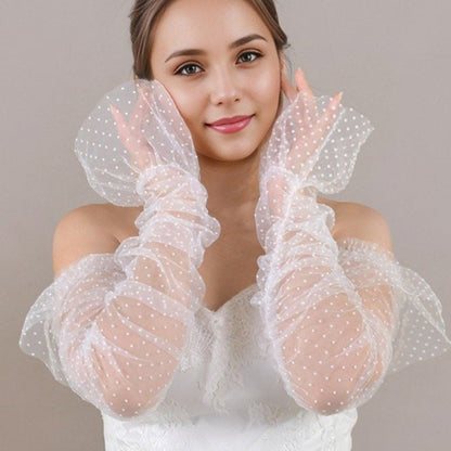 Sheer polka-dot long sleeves with gathered ruffled cuffs, white dots on light mesh