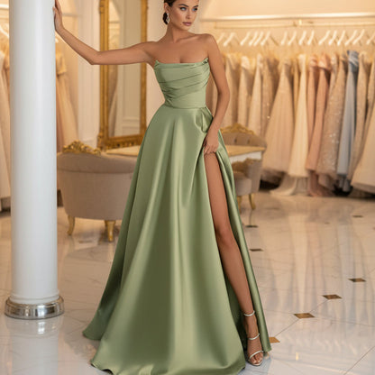 Green strapless satin A-line dress with ruched bodice and side slit