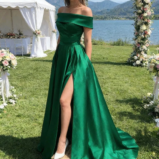 Green satin off-shoulder A-line dress with wide neckline and front slit