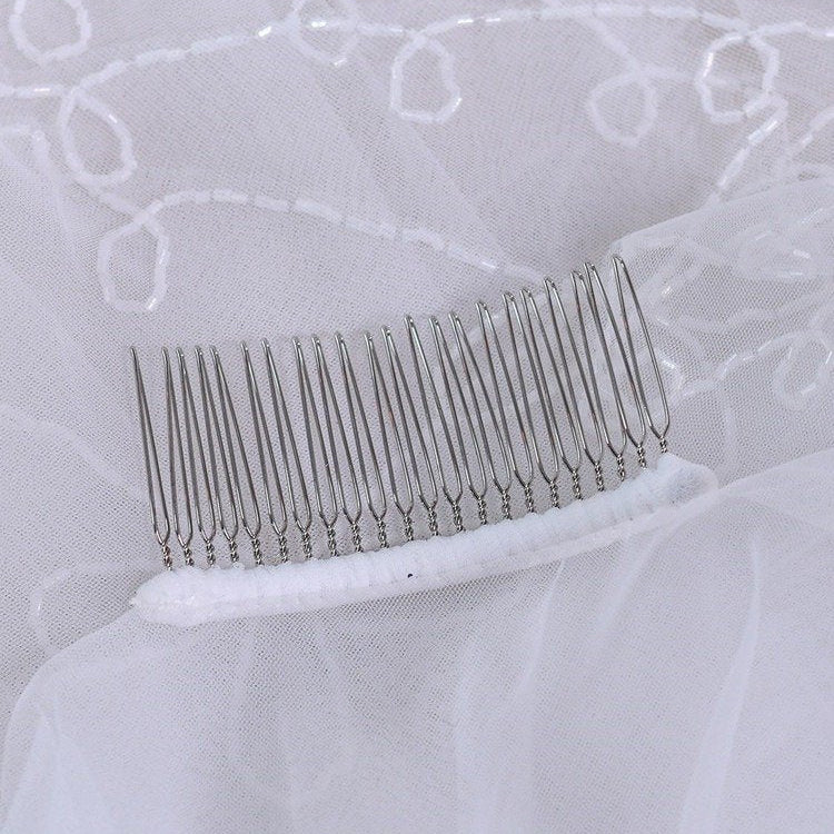 White tulle blusher veil comb with metal teeth and embroidered trim