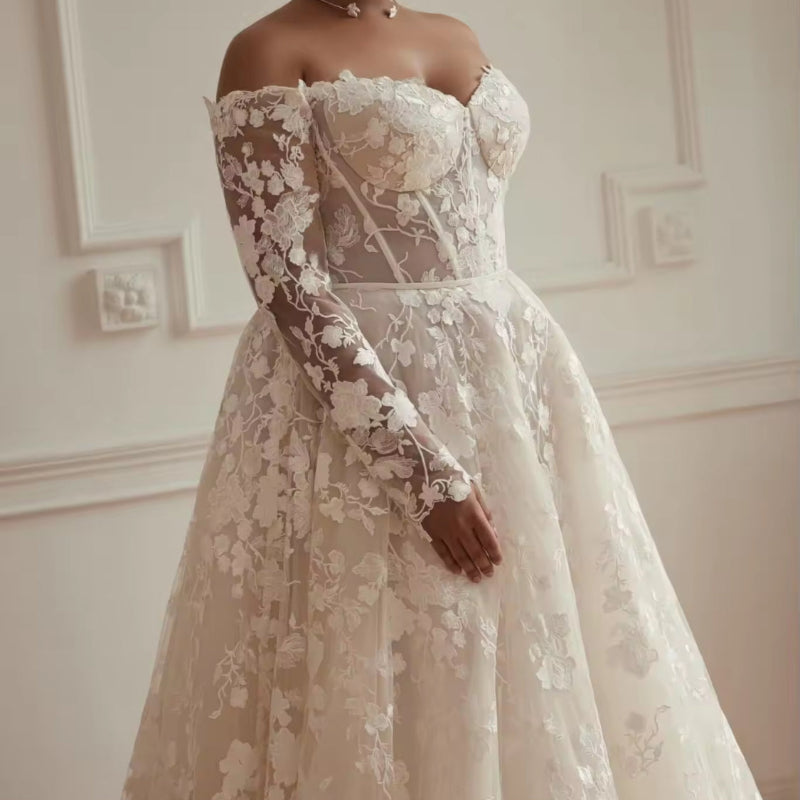 Off-shoulder lace wedding dress with corset bodice, floral appliques, sheer long sleeves