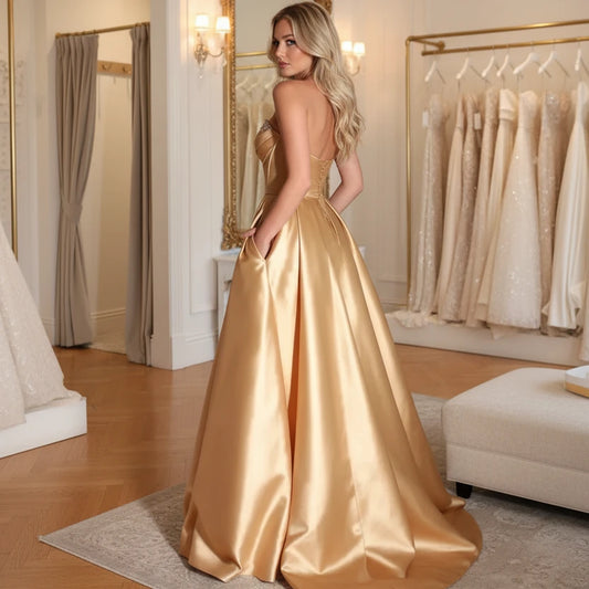 Strapless A-line satin dress with front slit, champagne-gold satin.