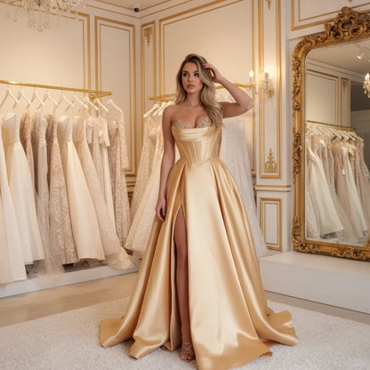 Strapless A-line satin dress with sequin bust and front slit, gold satin.