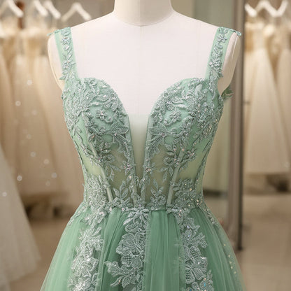 Green lace appliqué tulle bodice with V-neck and fitted waist, A-line skirt