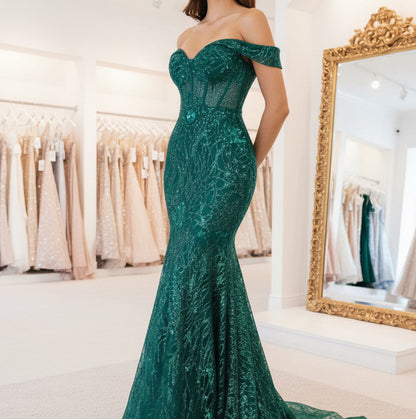 Emerald green off-shoulder sequin mermaid gown with ruffled hem