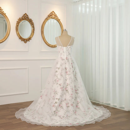 Floral A-line wedding dress with corset-style bodice and full tulle organza skirt