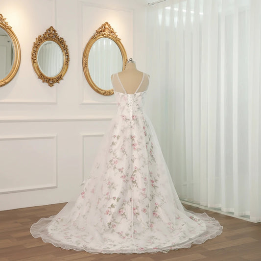 Floral A-line wedding dress with corset-style bodice and full tulle organza skirt