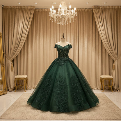 Evening gown in dark green with off-shoulder neckline and floral appliques