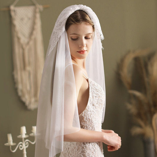 Ivory elbow-length veil with blusher, lace-trim edge and sheer front panel