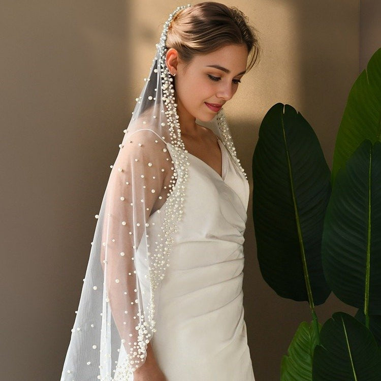 White tulle bridal veil with pearl bead fringe and scattered dot detailing