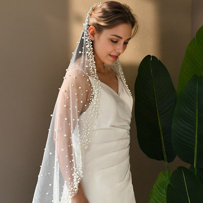 White tulle bridal veil with pearl bead fringe and scattered dot detailing