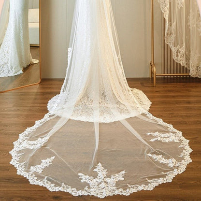 Ivory cathedral wedding veil with lace trim, single-tier scalloped border