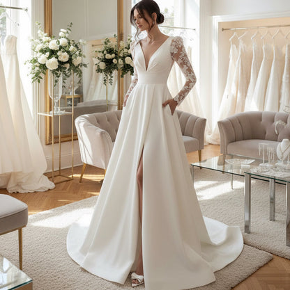 Ivory satin wedding dress with lace long sleeves, V-neck bodice, and thigh slit skirt