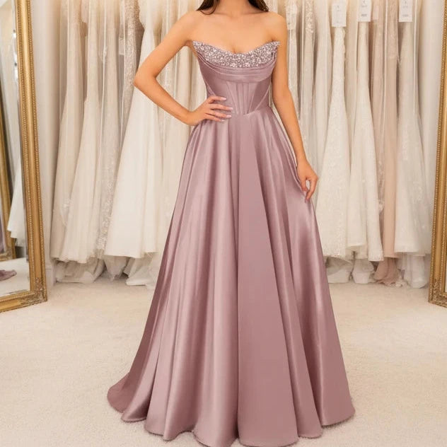 Mauve strapless beaded satin A-line evening gown with sparkling neckline trim