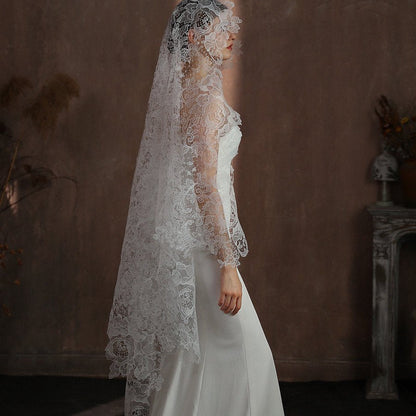 Ivory lace wedding veil with floral appliques and layered scalloped border