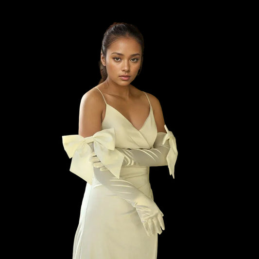 Ivory long satin bridal gloves with large bow detail at wrist