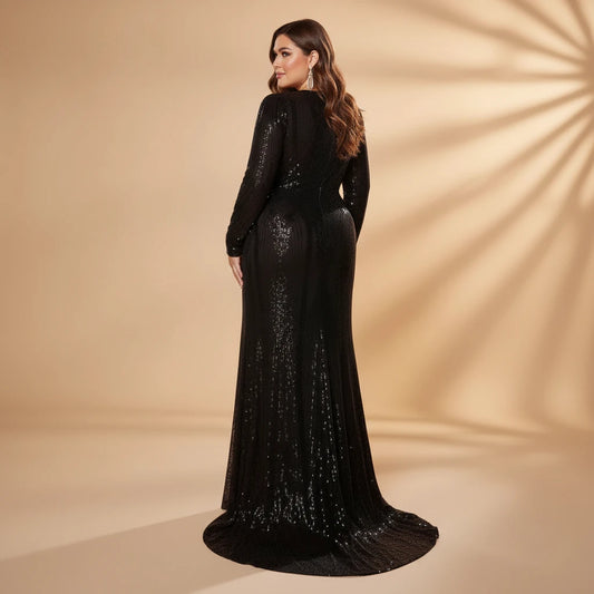 Black sequin mermaid evening gown, long sleeves, maxi length, back view.