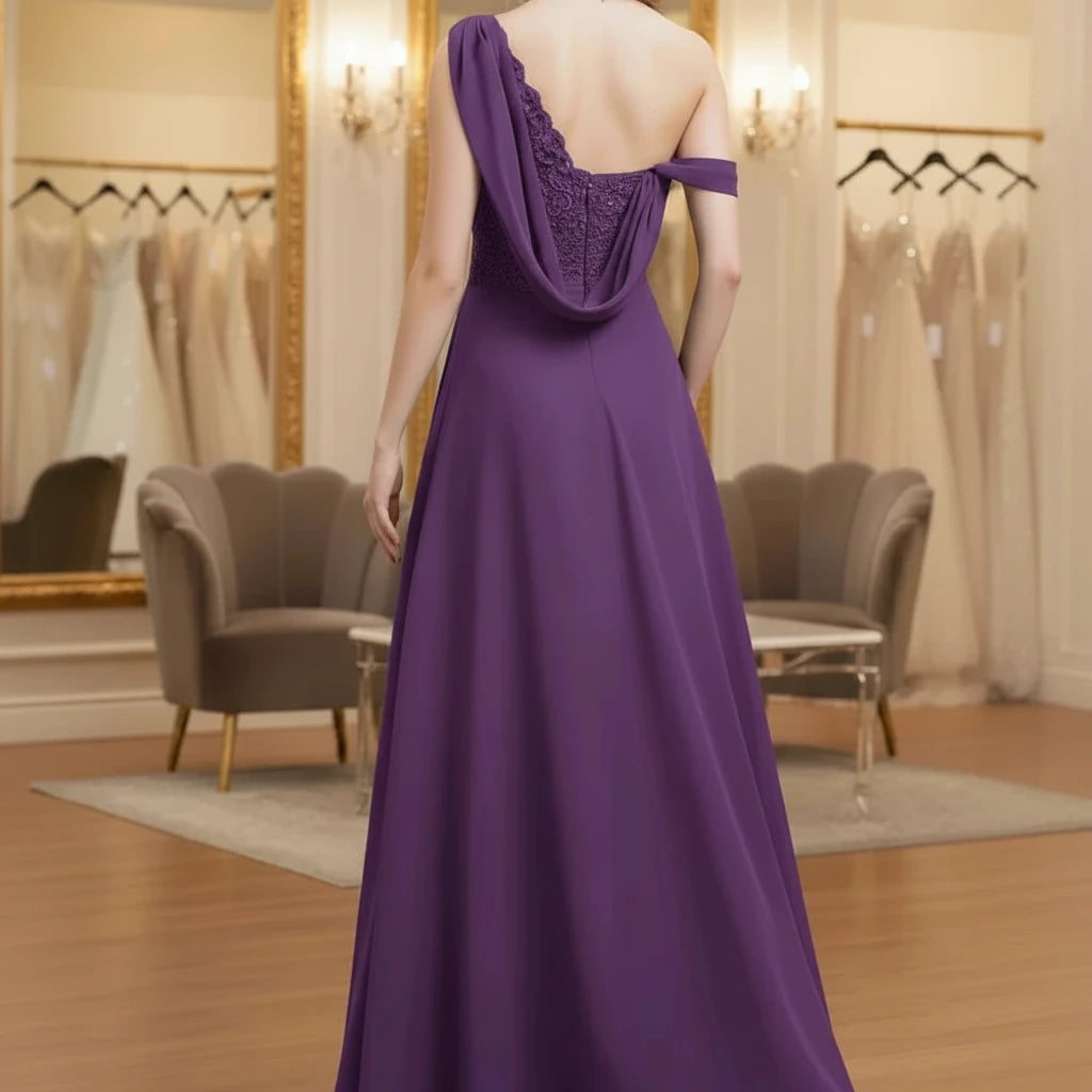 Navy one-shoulder chiffon A-line dress from the back with draped neckline and full skirt