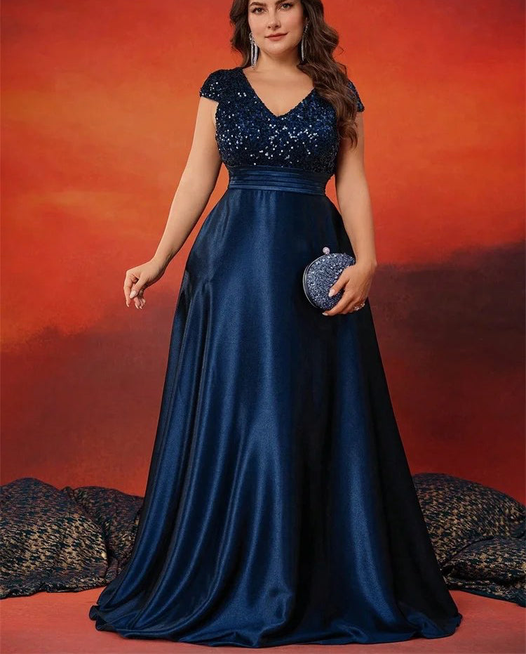 Navy evening dress with V-neck cap sleeves, sequined bodice and satin A-line skirt