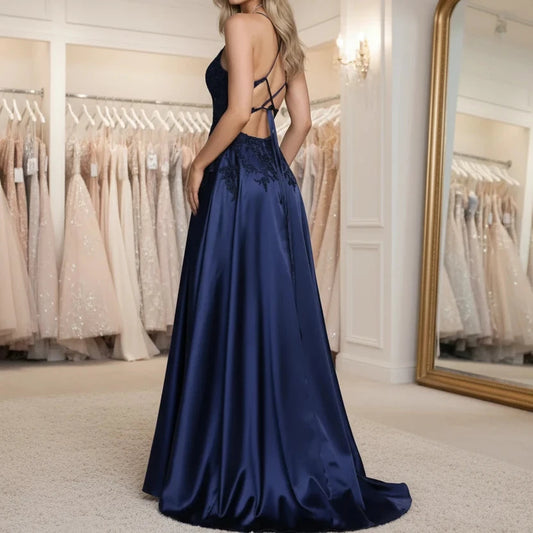 Navy satin evening dress with lace bodice, crisscross spaghetti straps, A-line skirt, slit