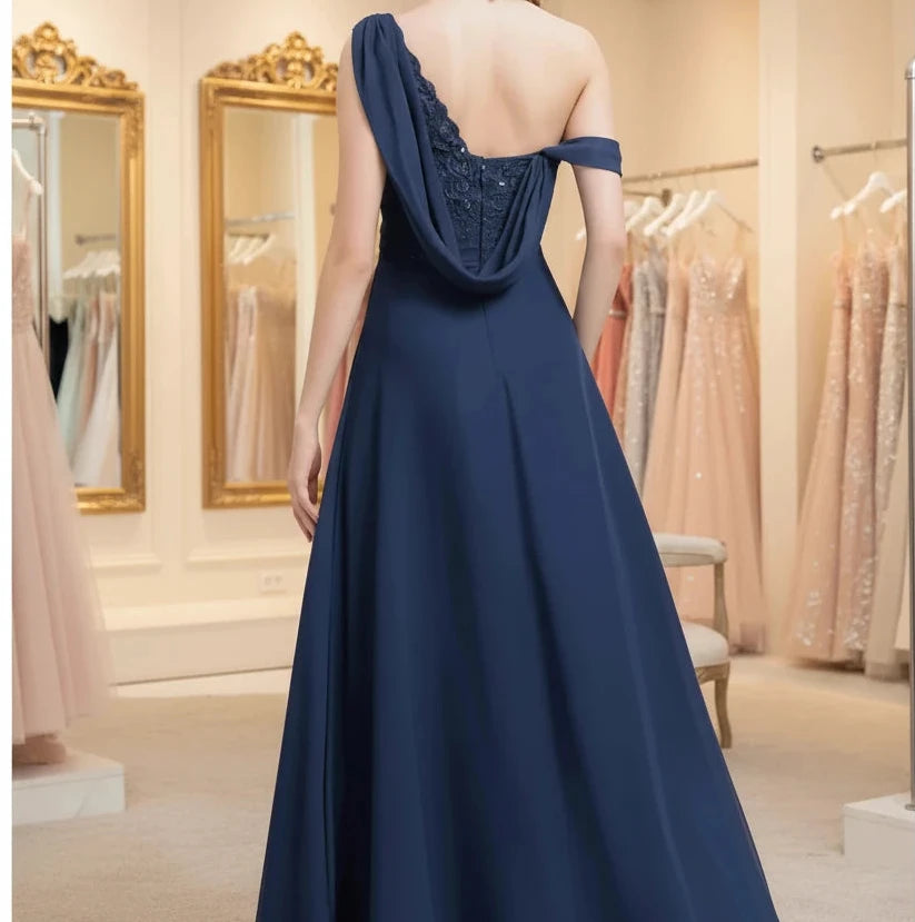 Navy chiffon one-shoulder A-line dress, open back with draped waist and layered full skirt