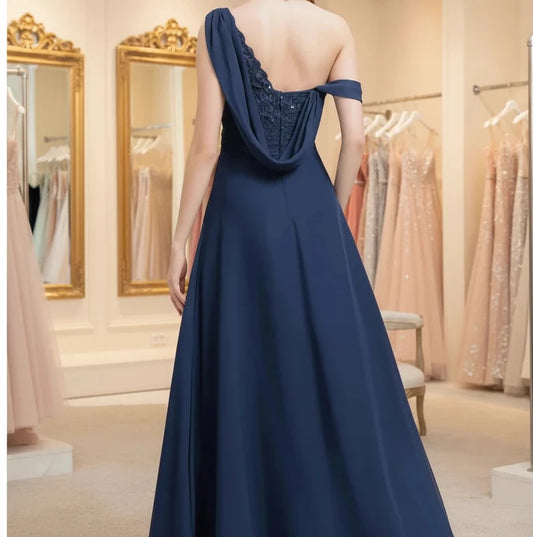 Navy chiffon one-shoulder A-line dress, open back with draped waist and layered full skirt