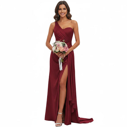 Burgundy satin mermaid gown with sweetheart neckline, spaghetti straps, ruched bodice, side slit.