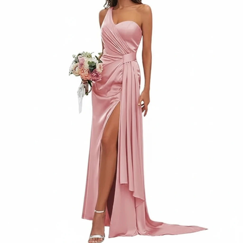 Pink satin mermaid bridesmaid gown with draped bodice and layered skirt slit