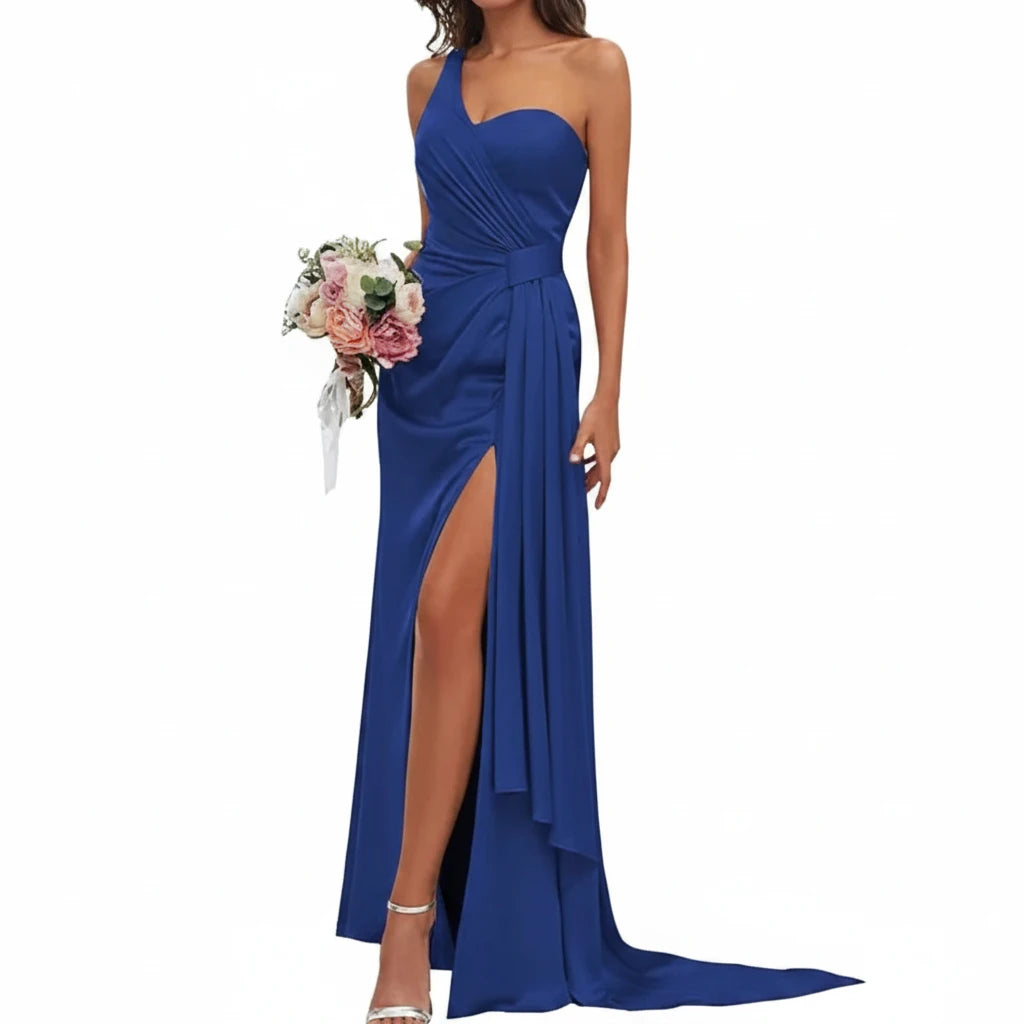 Navy satin mermaid gown with sweetheart neckline, spaghetti straps, ruched bodice, side slit.