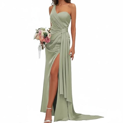 Sage green satin mermaid gown with sweetheart neckline, spaghetti straps, ruched bodice, side slit.